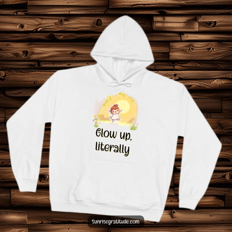 Funny hoodie depicting a character gleefully dancing among the first golden rays of sunlight, radiating pure joy.